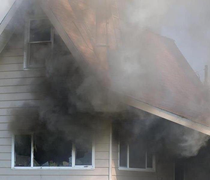 Smoke from a house fire.